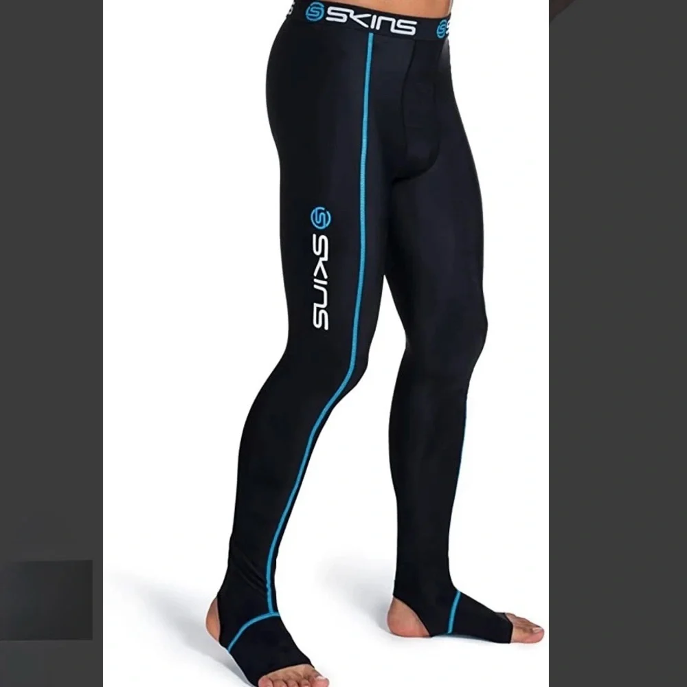 Skins Travel and Recovery Compression Tights in Black with Blue Stitching XS